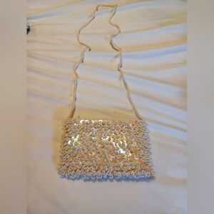 Sequins,  iridescent evening bag. Cord strap, immaculate  interior. Small size